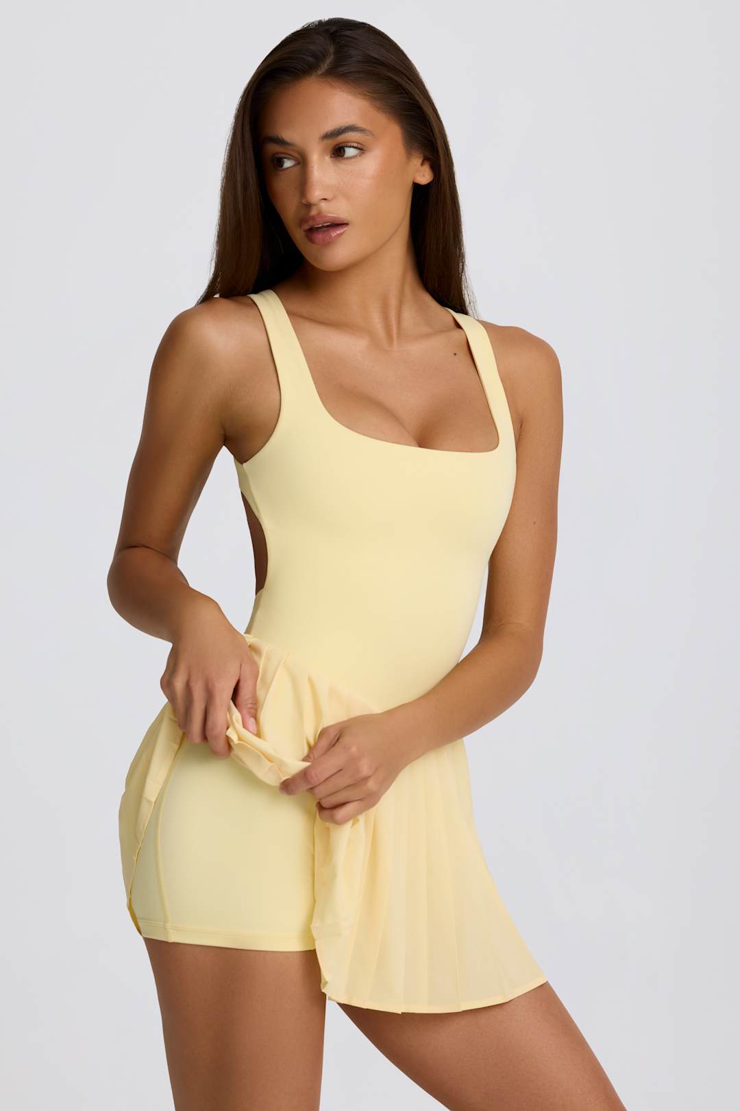 Soft Active Open-Back Pleated Tennis Dress in Ivory
