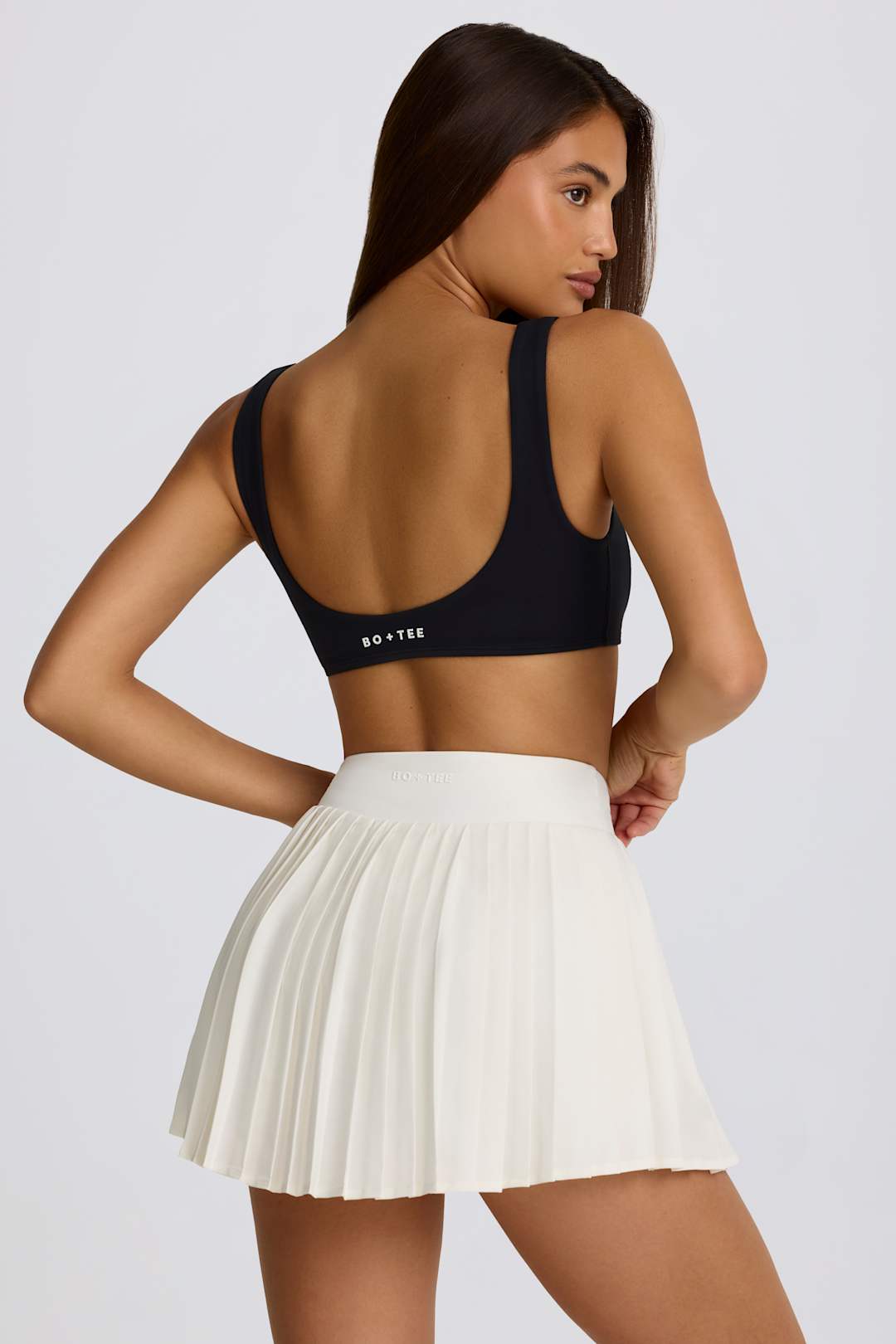 Soft Active Crossover Pleated Mini Skort in Lemon