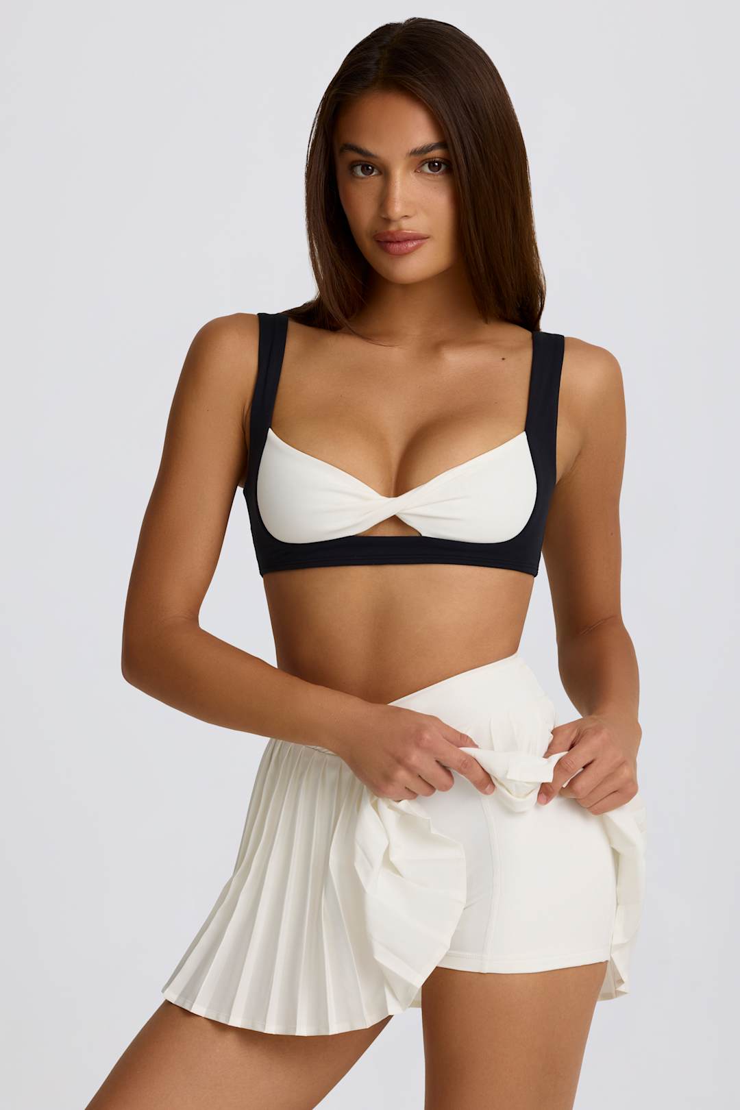 Soft Active Crossover Pleated Mini Skort in Lemon