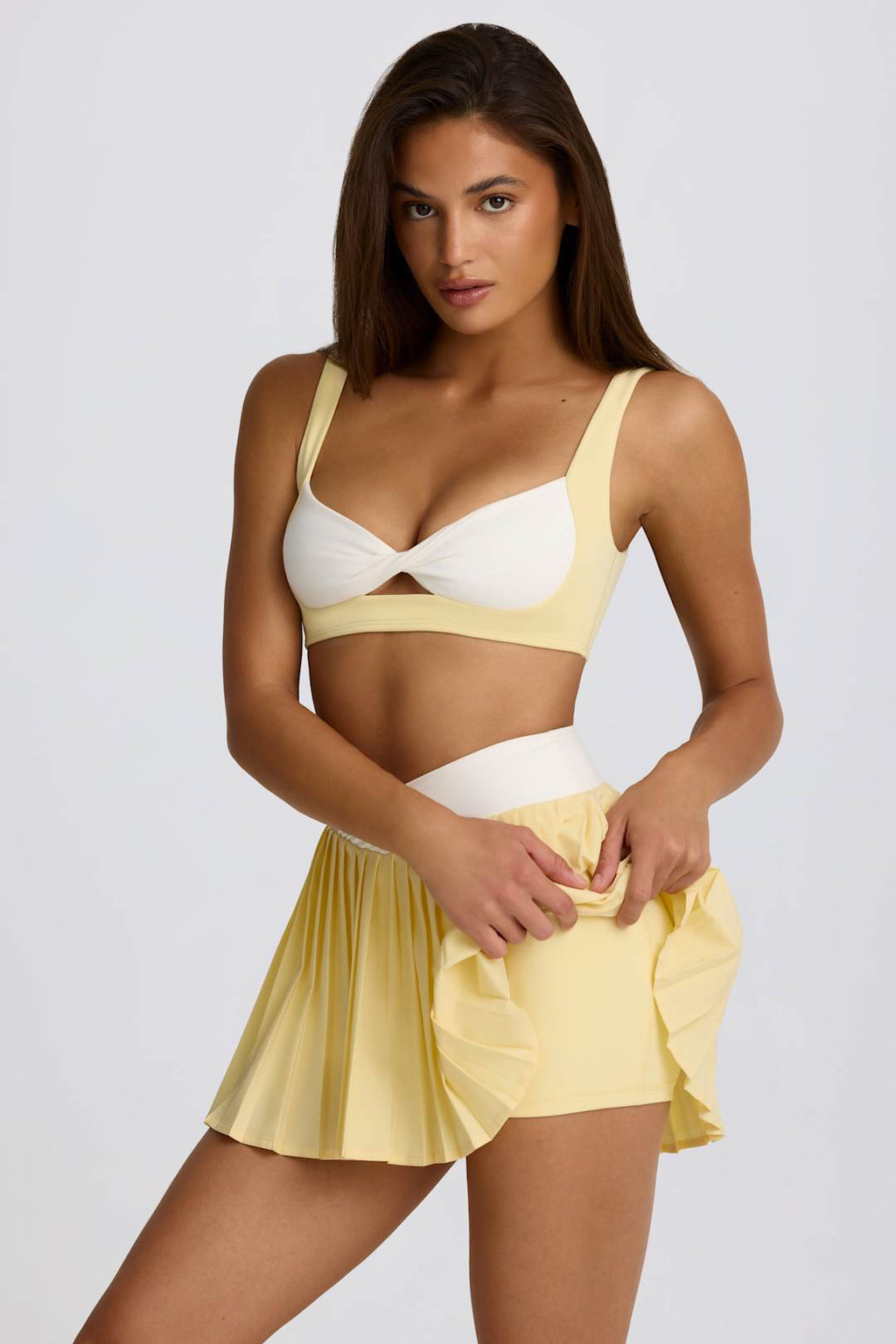 Soft Active Crossover Pleated Mini Skort in Lemon