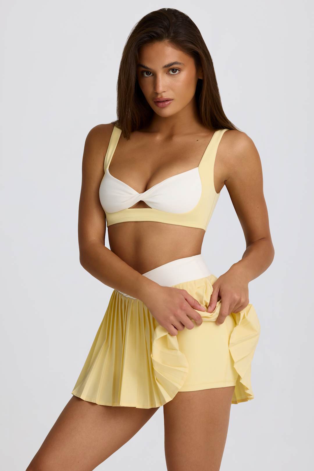 Soft Active Crossover Pleated Mini Skort in Lemon